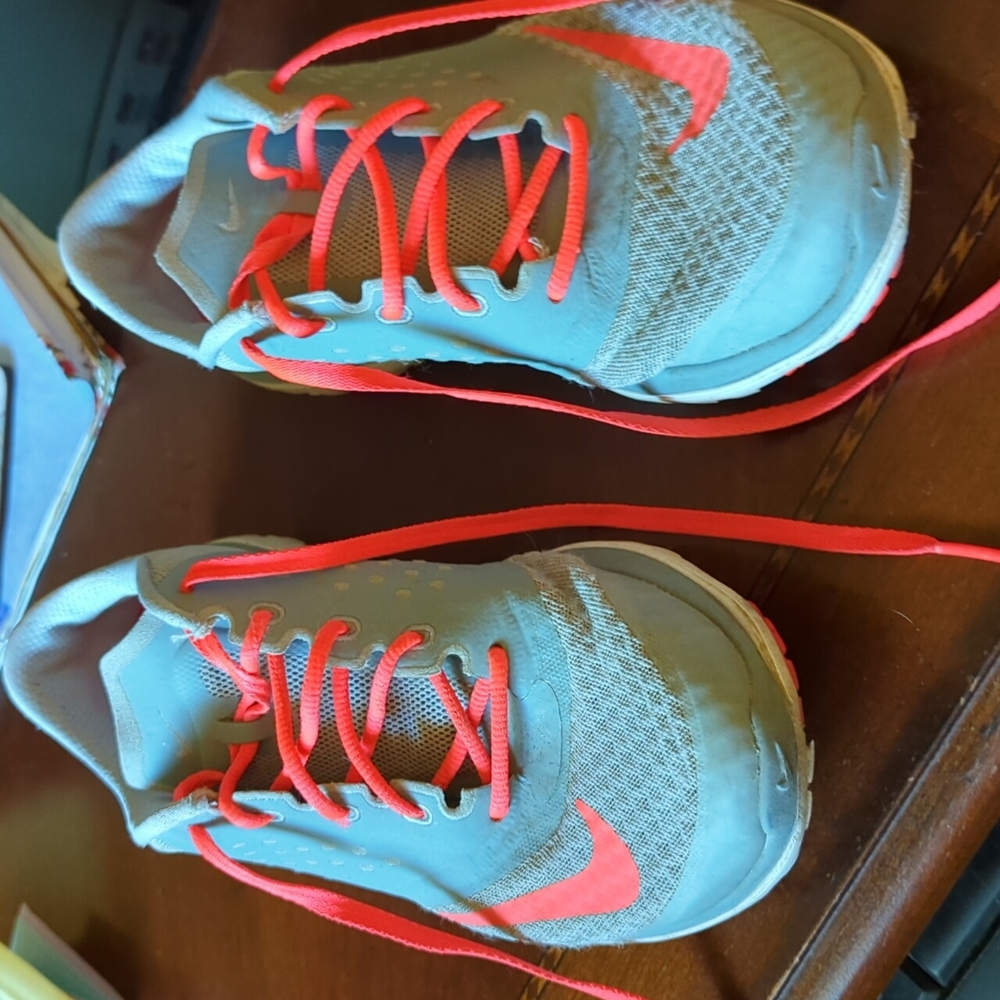 A pair of Nike sneakers, gently worn, still have life
